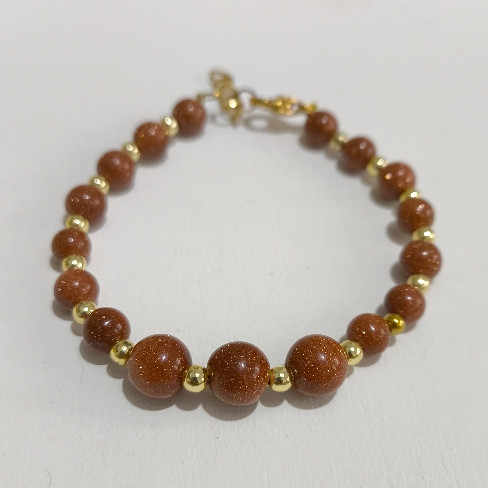 دستبند سنگ دلربا و حدید طلایی