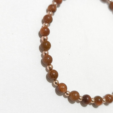 خرید دستبند سنگ دلربا و حدید گلد